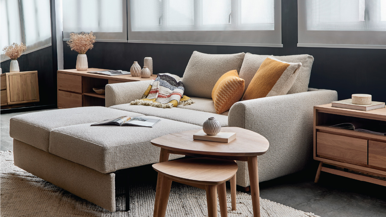 TREE sofa bed set up as everyday seating in a compact Hong Kong living room